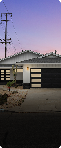 Modern home exterior at dusk